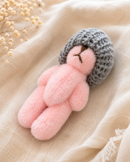 Peluche Minuscule - rose avec bonnet gris