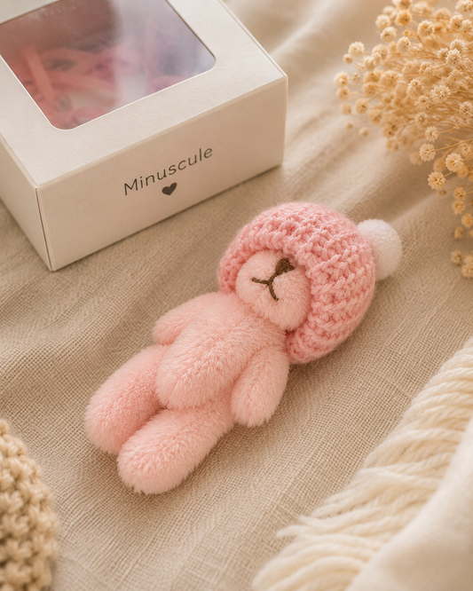 Peluche Minuscule - rose avec bonnet rose